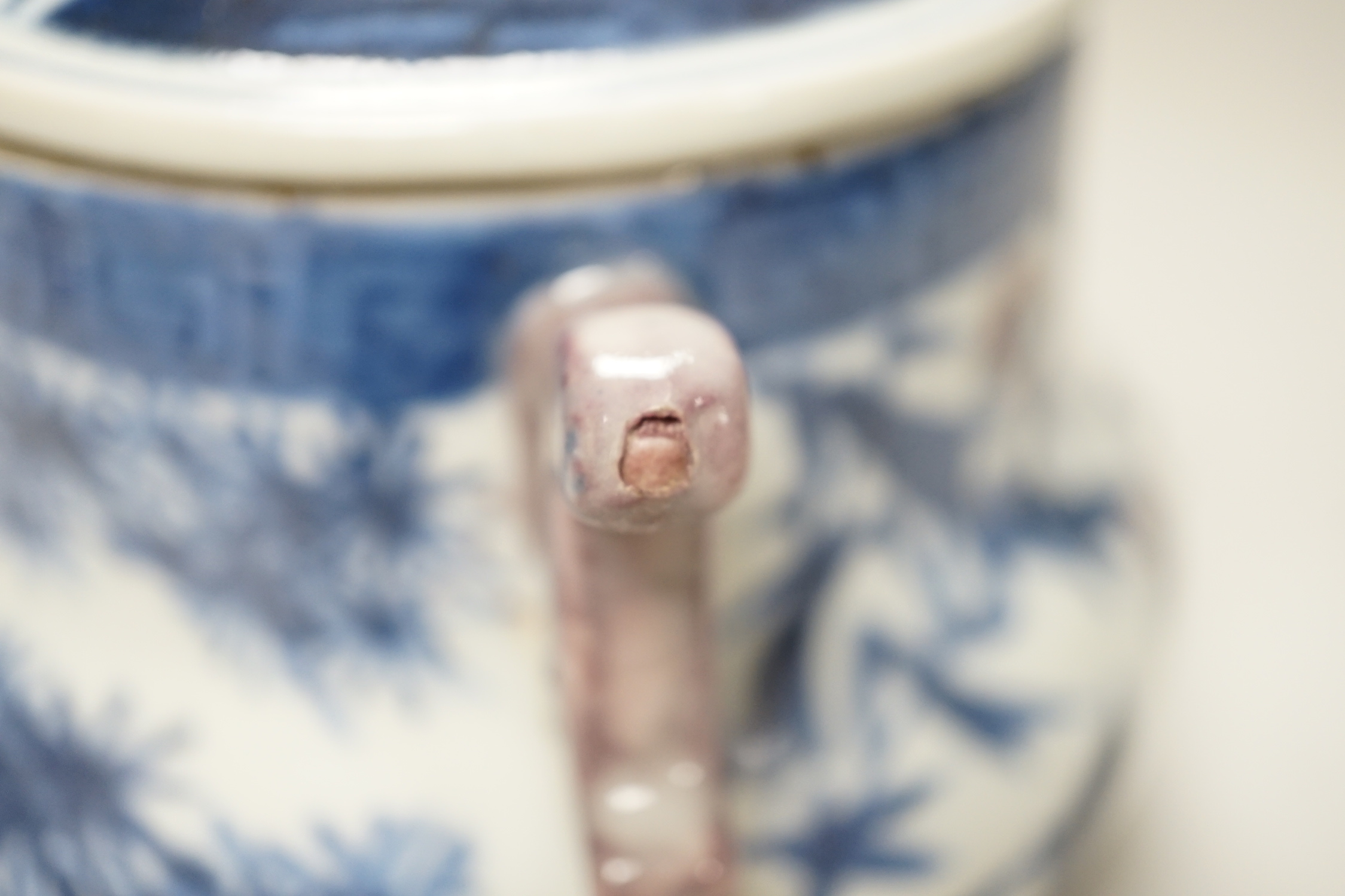 A Chinese underglaze blue and copper red pot and cover, 12cm high